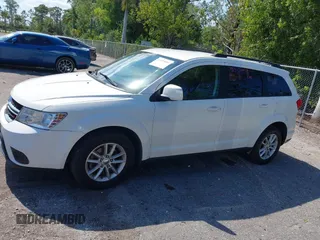 2015 Dodge Journey SXT with VIN 3C4PDCBG4FT727376, listed as a IAAI auction lot 42029881 with 151,042 mi miles. Bid and sale history available at carsss.com. Image 14.