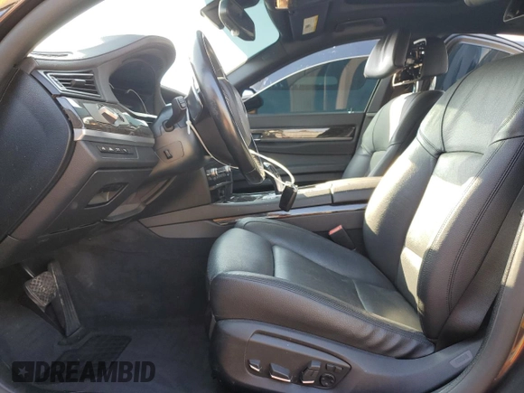 2015 BMW 7 Series 740i с VIN WBAYA6C59FD827049, выставлен на аукционе Copart как лот 43316645 с пробегом 97 677 миль миль и Списание • Salvage title. История ставок и продаж доступна на DreamBid. Изображение 7.
