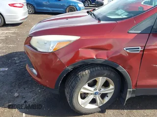 2014 Ford Escape SE with VIN 1FMCU9GX3EUA81161, listed as a IAAI auction lot 41968609 with 112,931 mi miles and . Bid and sale history available at DreamBid. Image 6.