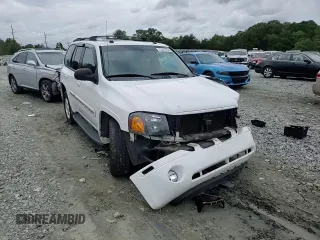2005 GMC Envoy SLT with VIN 1GKDS13S652330496, listed as a Copart auction lot 73317234 with 191,138 mi miles and Salvage Title. Bid and sale history available at DreamBid. Image 12.