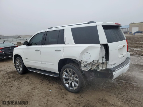 2016 Chevrolet Tahoe LTZ with VIN 1GNSKCKC8GR390130, listed as a Copart auction lot 86486834 with 127,213 mi miles and Salvage Title. Bid and sale history available at carsss.com. Image 2.