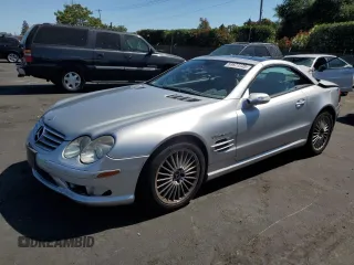 2005 Mercedes-Benz SL 55 AMG with VIN WDBSK74F35F088815, listed as a Copart auction lot 58671335 with 99,885 mi miles and Salvage title. Bid and sale history available at DreamBid. Image 1.
