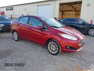 2016 Ford Fiesta Titanium z VIN 3FADP4CJ4GM163319, wystawiony jako IAAI lot #41767680 z przebiegiem 91 821 mil mil oraz . Historia ofert i sprzedaży dostępna na DreamBid. Obrazek 1.