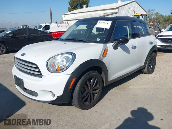 2013 MINI Countryman with VIN WMWZB3C56DWR35601, listed as a IAAI auction lot 42689147 with 80,024 mi miles and . Bid and sale history available at DreamBid. Image 2.