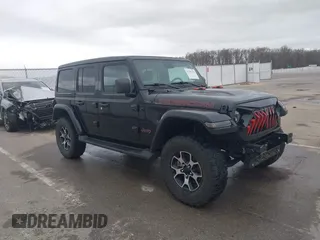 2021 Jeep Wrangler Unlimited Rubicon with VIN 1C4HJXFG8MW775419, listed as a IAAI auction lot 41797178 with 56,166 mi miles. Bid and sale history available at carsss.com. Image 1.
