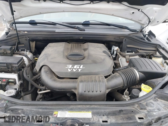 2013 Jeep Grand Cherokee Overland with VIN 1C4RJECG5DC648593, listed as a IAAI auction lot 41576630 with 187,098 mi miles. Bid and sale history available at carsss.com. Image 10.