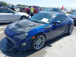 2015 Scion FR-S with VIN JF1ZNAA18F9712580, listed as a IAAI auction lot 42223595 with 157,384 mi miles and . Bid and sale history available at carsss.com. Image 17.