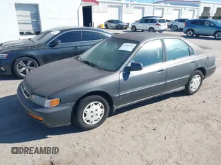 1997 Honda Accord Value with VIN 1HGCD5689VA182425, listed as a IAAI auction lot 41702660 with 208,005 mi miles and . Bid and sale history available at carsss.com. Image 2.