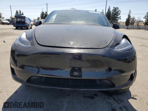 2024 Tesla Model Y Long Range with VIN 7SAYGDEE0RF123793, listed as a Copart auction lot 57177305 with 20,053 mi miles and Salvage title. Bid and sale history available at DreamBid. Image 5.