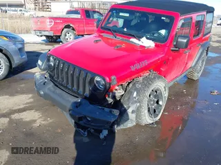 2021 Jeep Wrangler Unlimited Willys Sport with VIN 1C4HJXDG9MW754873, listed as a IAAI auction lot 41641167 with 25,410 mi miles and . Bid and sale history available at DreamBid. Image 2.