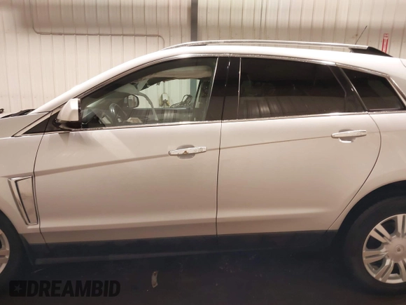 2016 Cadillac SRX Luxury Collection with VIN 3GYFNEE3XGS566210, listed as a IAAI auction lot 42094984 with 99,671 mi miles and . Bid and sale history available at DreamBid. Image 14.