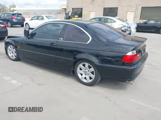 2002 BMW 3 Series 325Ci with VIN WBABN33482JW53230, listed as a IAAI auction lot 41912031 with 211,631 mi miles. Bid and sale history available at carsss.com. Image 3.
