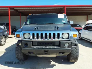 2004 Hummer H2 with VIN 5GRGN23U64H101592, listed as a IAAI auction lot 41379405 with 174,672 mi miles. Bid and sale history available at carsss.com. Image 12.
