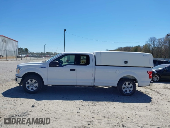2018 Ford F-150 XL with VIN 1FTFX1C57JKF08037, listed as a IAAI auction lot 41863806 with 195,725 mi miles and . Bid and sale history available at DreamBid. Image 14.