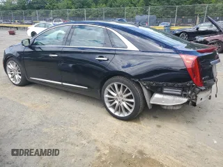 2014 Cadillac XTS Platinum z VIN 2G61W5S86E9151010, wystawiony jako Copart lot #58155335 z przebiegiem 48 437 mil mil oraz Szkoda całkowita • Salvage title. Historia ofert i sprzedaży dostępna na DreamBid. Obrazek 2.