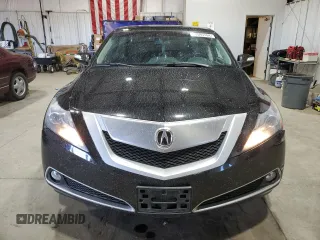 2010 Acura ZDX Tech Pkg with VIN 2HNYB1H45AH502648, listed as a Copart auction lot 77595704 with 53,670 mi miles and Salvage Title. Bid and sale history available at carsss.com. Image 5.