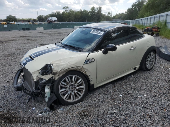 2012 MINI Coupe S z VIN WMWSX3C56CT154872, wystawiony jako Copart lot #68011264 z przebiegiem 91 650 mil mil oraz Szkody całkowita. Historia ofert i sprzedaży dostępna na DreamBid. Obrazek 1.