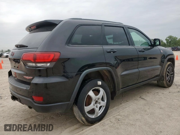 2019 Jeep Grand Cherokee Trailhawk with VIN 1C4RJFLG8KC613582, listed as a Copart auction lot 62901405 with 136,809 mi miles and Salvage title. Bid and sale history available at DreamBid. Image 3.