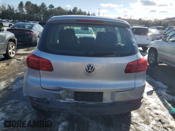 2014 Volkswagen Tiguan SE z VIN WVGAV3AX9EW563907, wystawiony jako Copart lot #45157495 z przebiegiem 100 174 mil mil oraz Szkoda całkowita • Salvage title. Historia ofert i sprzedaży dostępna na DreamBid. Obrazek 6.