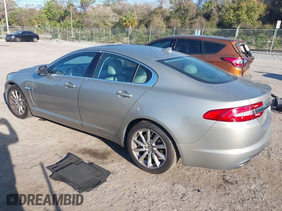 2013 Jaguar XF I4 RWD with VIN SAJWA0ES3DPU01767, listed as a IAAI auction lot 41704883 with 54,797 mi miles. Bid and sale history available at carsss.com. Image 3.