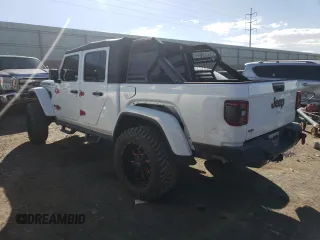 2020 Jeep Gladiator Rubicon with VIN 1C6JJTBG7LL152204, listed as a Copart auction lot 83525554 with 7,030 mi miles and Salvage title. Bid and sale history available at DreamBid. Image 2.
