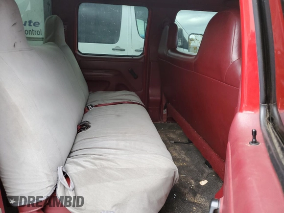 1996 Ford F-350 with VIN 1FTJW35F3TEB59586, listed as a Copart auction lot 79329304 with 199,054 mi miles and Salvage title. Bid and sale history available at DreamBid. Image 10.