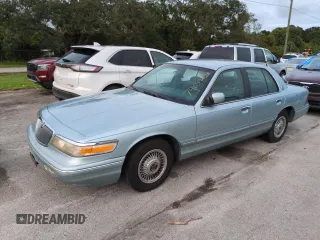 1996 Mercury Grand Marquis GS with VIN 2MELM74W5TX653873, listed as a Copart auction lot 74659254 with 86,589 mi miles and Salvage Title. Bid and sale history available at DreamBid. Image 1.