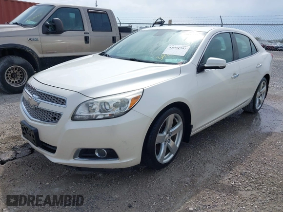 2013 Chevrolet Malibu LTZ with VIN 1G11J5SX6DF348664, listed as a IAAI auction lot 41994207 with 202,008 mi miles and . Bid and sale history available at DreamBid. Image 2.