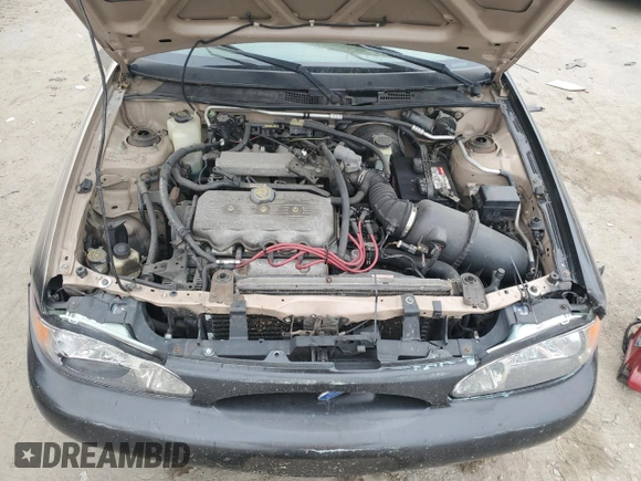 1999 Ford Escort SE z VIN 1FAFP13P7XW274653, wystawiony jako Copart lot #71997184 z przebiegiem 67 876 mil mil oraz Szkoda całkowita • Salvage title. Historia ofert i sprzedaży dostępna na DreamBid. Obrazek 11.