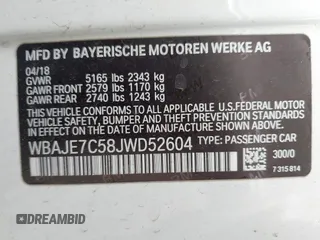 2018 BMW 5 Series 540i xDrive with VIN WBAJE7C58JWD52604, listed as a IAAI auction lot 42264240 with 107,454 mi miles and . Bid and sale history available at DreamBid. Image 9.