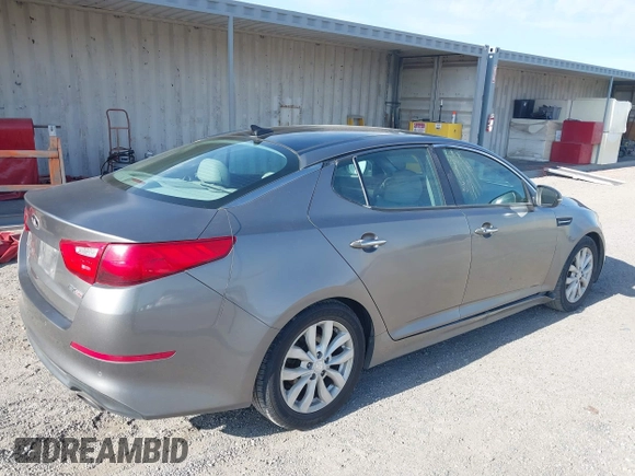 2014 Kia Optima EX with VIN 5XXGN4A7XEG346890, listed as a IAAI auction lot 42174866 with 179,450 mi miles and . Bid and sale history available at carsss.com. Image 4.