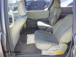 2011 Toyota Sienna with VIN 5TDZK3DC6BS125737, listed as a IAAI auction lot 41815233 with 248,318 mi miles. Bid and sale history available at carsss.com. Image 8.