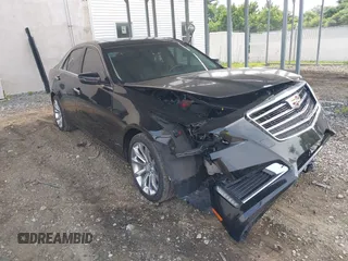 2018 Cadillac CTS Luxury AWD z VIN 1G6AX5SX0J0125737, wystawiony jako IAAI lot #42323501 z przebiegiem 52 967 mil mil oraz . Historia ofert i sprzedaży dostępna na DreamBid. Obrazek 1.