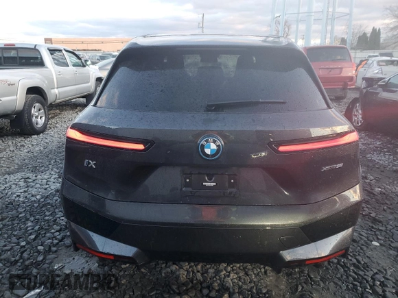 2022 BMW iX xDrive50 with VIN WB523CF05NCK62929, listed as a Copart auction lot 83295544 with 24,299 mi miles and Salvage Title. Bid and sale history available at carsss.com. Image 6.