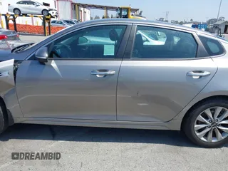 2018 Kia Optima S with VIN 5XXGT4L34JG263479, listed as a IAAI auction lot 42675426 with Not provided miles and . Bid and sale history available at DreamBid. Image 13.