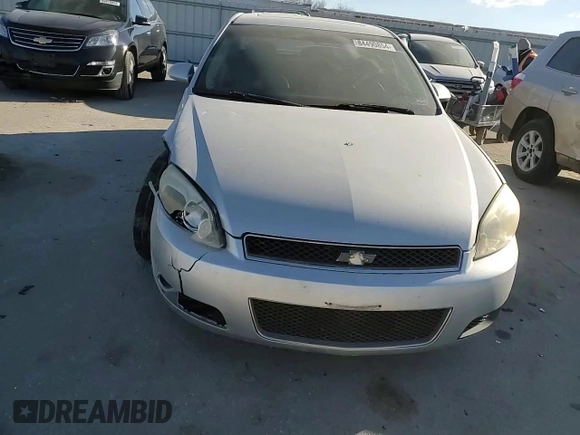 2012 Chevrolet Impala LTZ with VIN 2G1WC5E32C1171240, listed as a Copart auction lot 84490854 with 193,799 mi miles and Salvage Title. Bid and sale history available at DreamBid. Image 11.