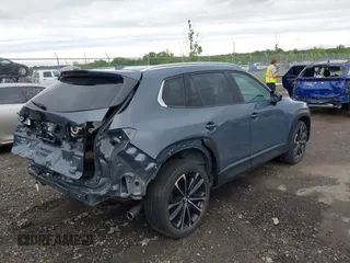 2023 Mazda CX-50 S Premium Plus z VIN 7MMVABEM6PN105424, wystawiony jako IAAI lot #42148825 z przebiegiem 40 434 mil mil oraz . Historia ofert i sprzedaży dostępna na DreamBid. Obrazek 4.