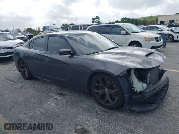 2019 Dodge Charger GT with VIN 2C3CDXHG6KH628451, listed as a IAAI auction lot 40750593 with 80,996 mi miles and . Bid and sale history available at DreamBid. Image 1.