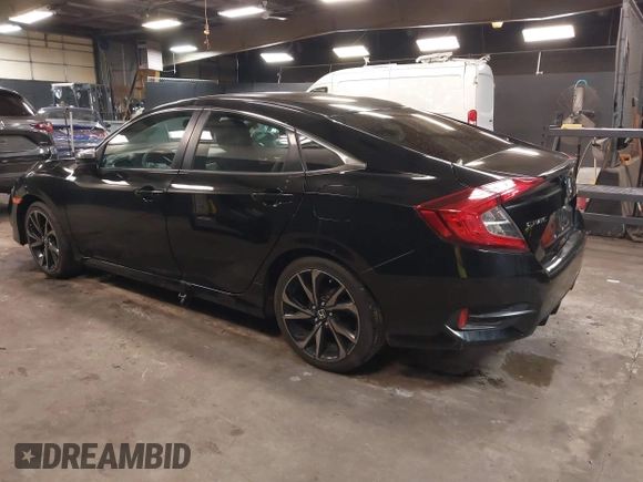 2019 Honda Civic Sport with VIN 2HGFC2F84KH590469, listed as a IAAI auction lot 41686757 with 79,602 mi miles and . Bid and sale history available at DreamBid. Image 3.
