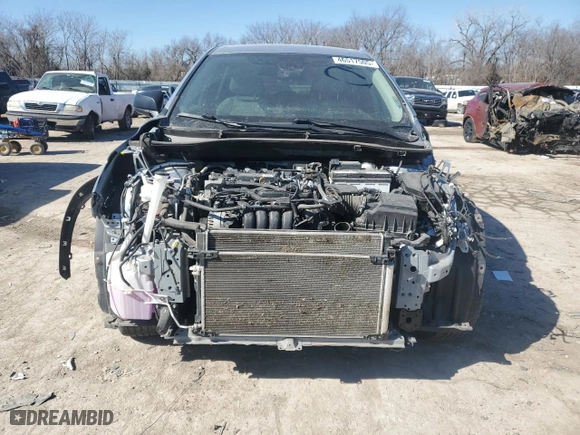 2022 Toyota Corolla Cross L with VIN 7MUAAAAG8NV022454, listed as a Copart auction lot 46517505 with 50,321 mi miles and Salvage Title. Bid and sale history available at carsss.com. Image 5.