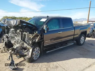 2015 GMC Sierra 2500HD available WiFi Denali with VIN 1GT120E81FF147611, listed as a IAAI auction lot 41536669 with 1 mi miles. Bid and sale history available at carsss.com. Image 2.