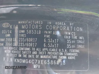 2014 Kia Sedona LX with VIN KNDMG4C7XE6586613, listed as a IAAI auction lot 41597187 with 211,851 mi miles. Bid and sale history available at carsss.com. Image 9.