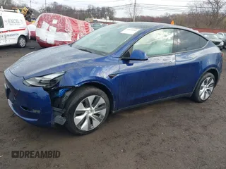 2023 Tesla Model Y Long Range z VIN 7SAYGDEE2PF694974, wystawiony jako IAAI lot #41814582 z przebiegiem 31 726 mil mil oraz . Historia ofert i sprzedaży dostępna na DreamBid. Obrazek 2.