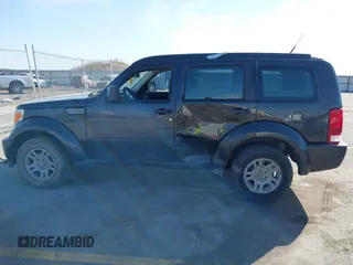 2011 Dodge Nitro SE z VIN 1D4PT2GK7BW520224, wystawiony jako IAAI lot #41781346 z przebiegiem 152 140 mil mil oraz . Historia ofert i sprzedaży dostępna na DreamBid. Obrazek 14.