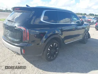 2023 Kia Telluride SX z VIN 5XYP54GC9PG401994, wystawiony jako IAAI lot #40804320 z przebiegiem 21 745 mil mil oraz . Historia ofert i sprzedaży dostępna na DreamBid. Obrazek 4.