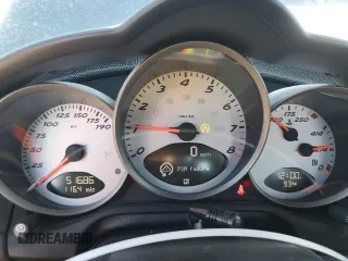 2006 Porsche Cayman S с VIN WP0AB29866U782423, выставлен на аукционе Copart как лот 87725325 с пробегом 51 686 миль миль и Списание • Salvage title. История ставок и продаж доступна на DreamBid. Изображение 9.