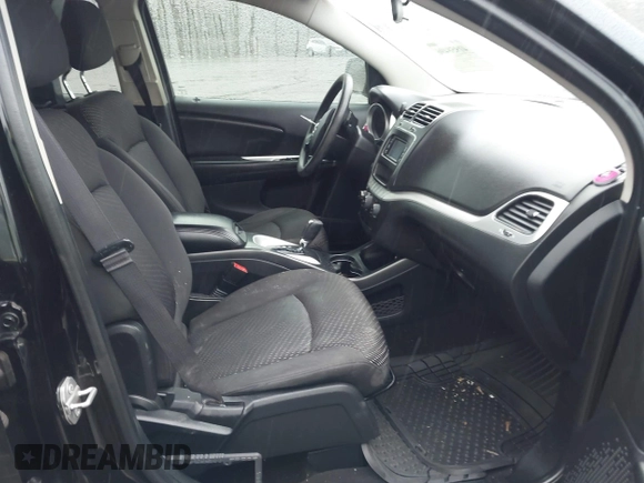 2015 Dodge Journey SXT with VIN 3C4PDDBG5FT639992, listed as a IAAI auction lot 41958496 with 132,410 mi miles and . Bid and sale history available at DreamBid. Image 5.