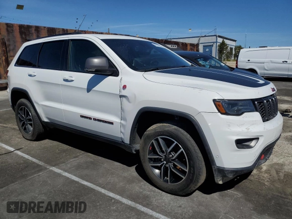 2021 Jeep Grand Cherokee Trailhawk with VIN 1C4RJFLG5MC565316, listed as a Copart auction lot 49899935 with 69,261 mi miles and Salvage Title. Bid and sale history available at carsss.com. Image 4.