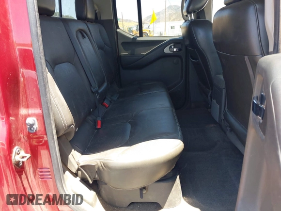 2015 Nissan Frontier SL with VIN 1N6AD0EV1FN711521, listed as a IAAI auction lot 42525352 with 203,114 mi miles and . Bid and sale history available at DreamBid. Image 8.