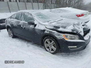 2014 Volvo S60 T5 z VIN YV1612FS7E2272997, wystawiony jako IAAI lot #41342657 z przebiegiem 89 633 mil mil oraz . Historia ofert i sprzedaży dostępna na DreamBid. Obrazek 1.